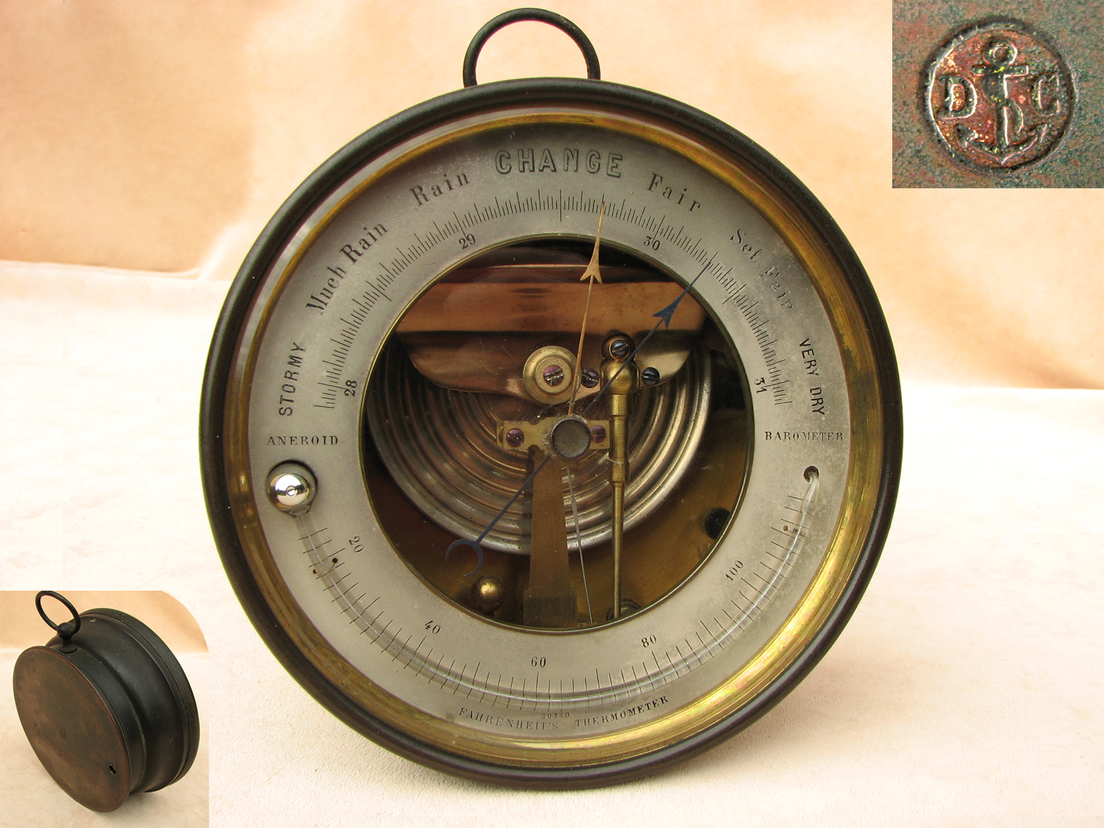 Dubois & Casse brass barometer with open face dial and thermometer, circa 1870.